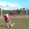 Stupid guy gets nailed in face with ball.